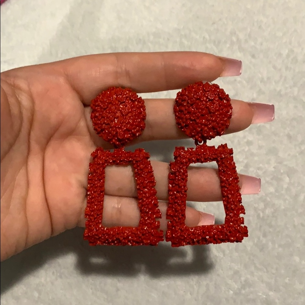 Red dangle earrings